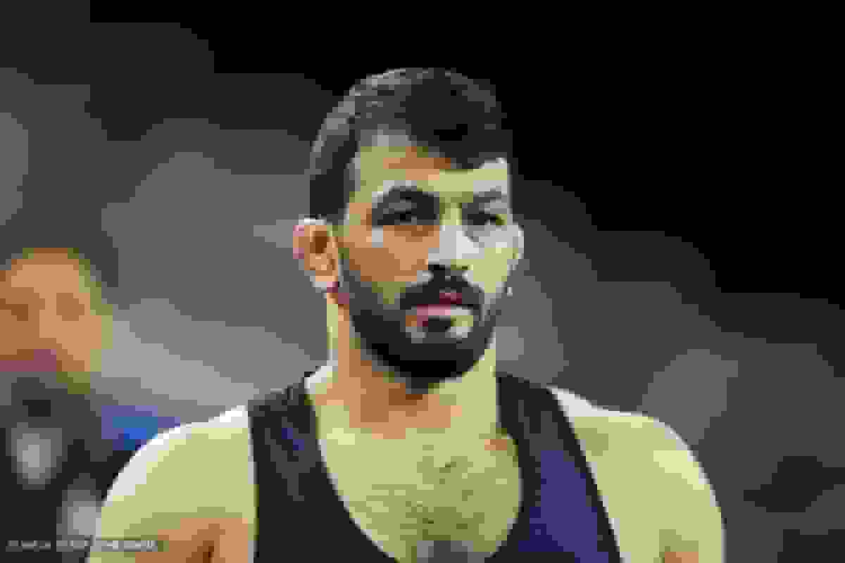 علت غیبت حسن یزدانی در اردوی تیم ملی کشتی چیست؟