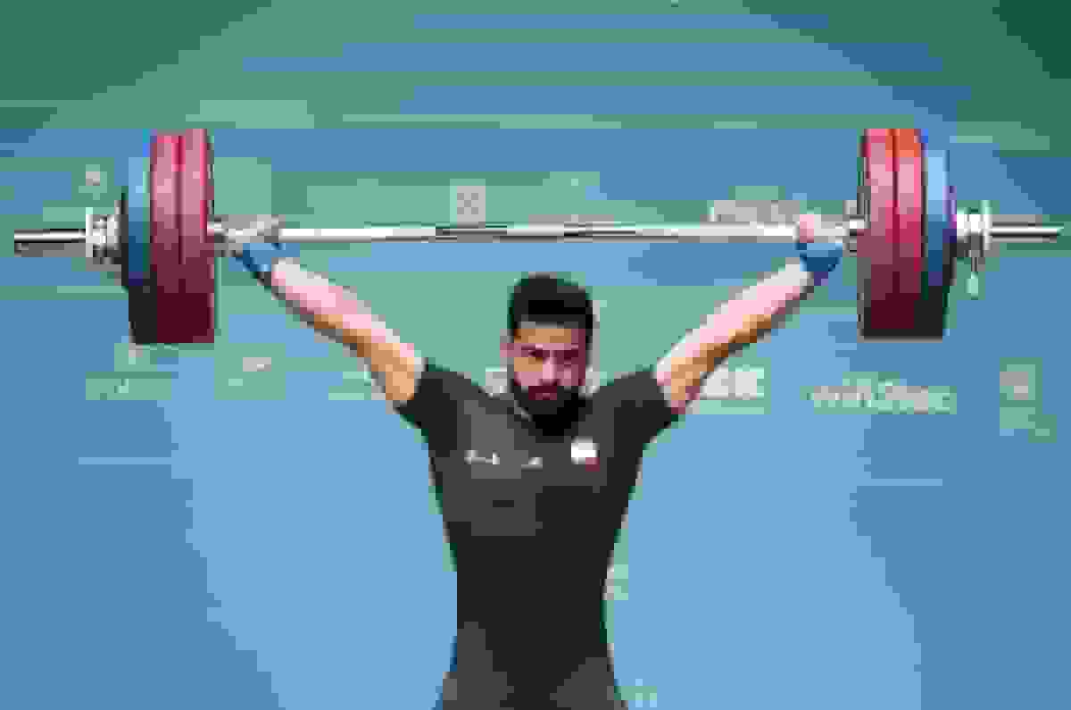 2 مدال نقره و یک برنز برای علیرضا معینی در مسابقات وزنه‌برداری عربستان