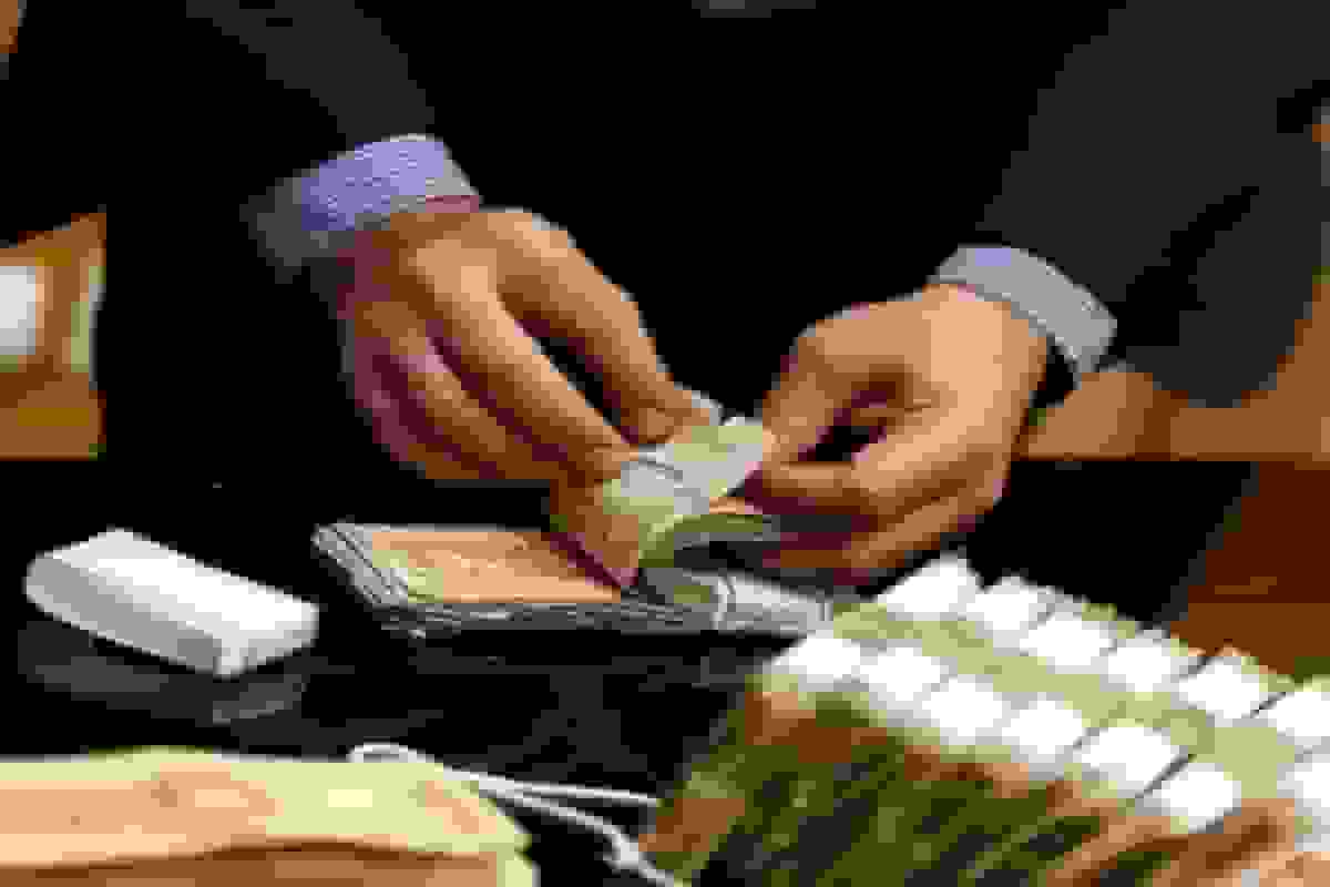 دستگیری کلاهبردار با اسکناس جعلی در تهران